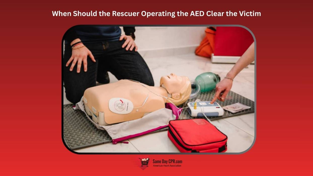 When Should the Rescuer Operating the AED Clear the Victim